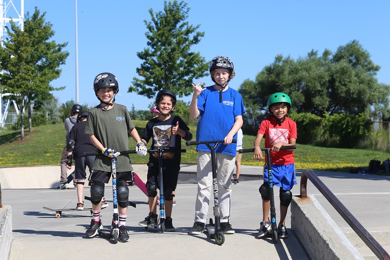 Kids on scooters at Evolve Camps Canadian action sports camp